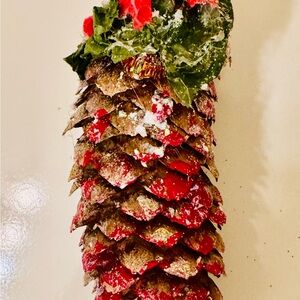 Festive Pinecone Decoration with Red Accents